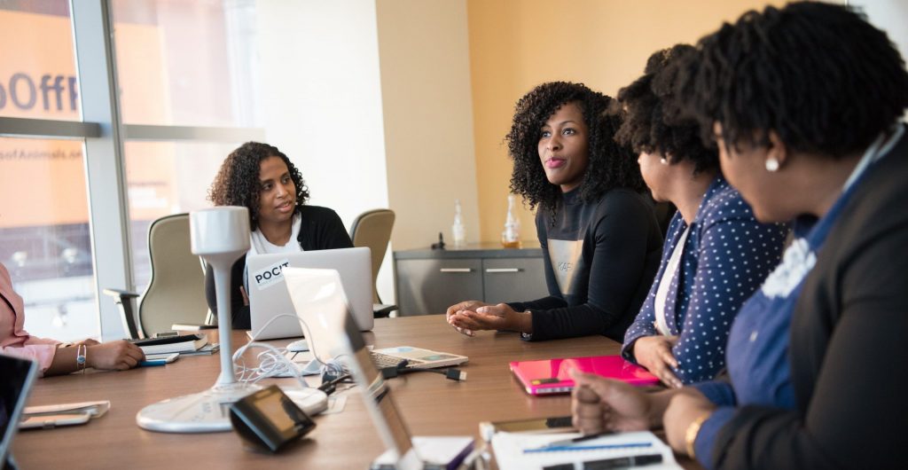 Four woman at the conference room