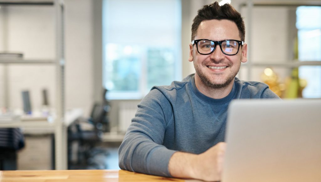 Photo of man wearing eyeglasses