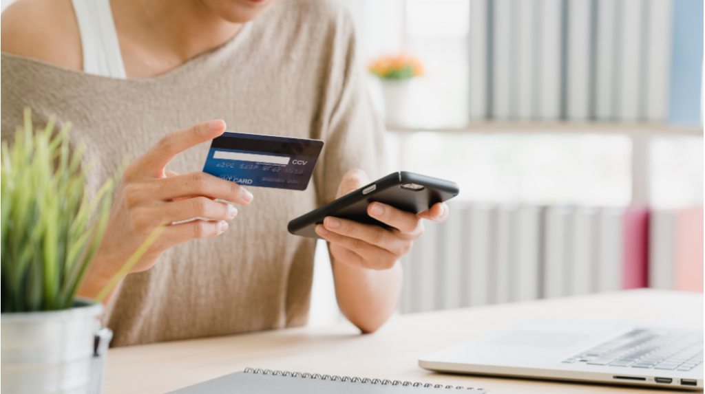 Woman Using Credit Card 