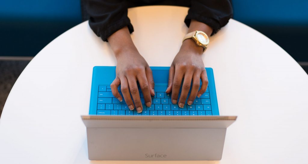 Person typing on a laptop