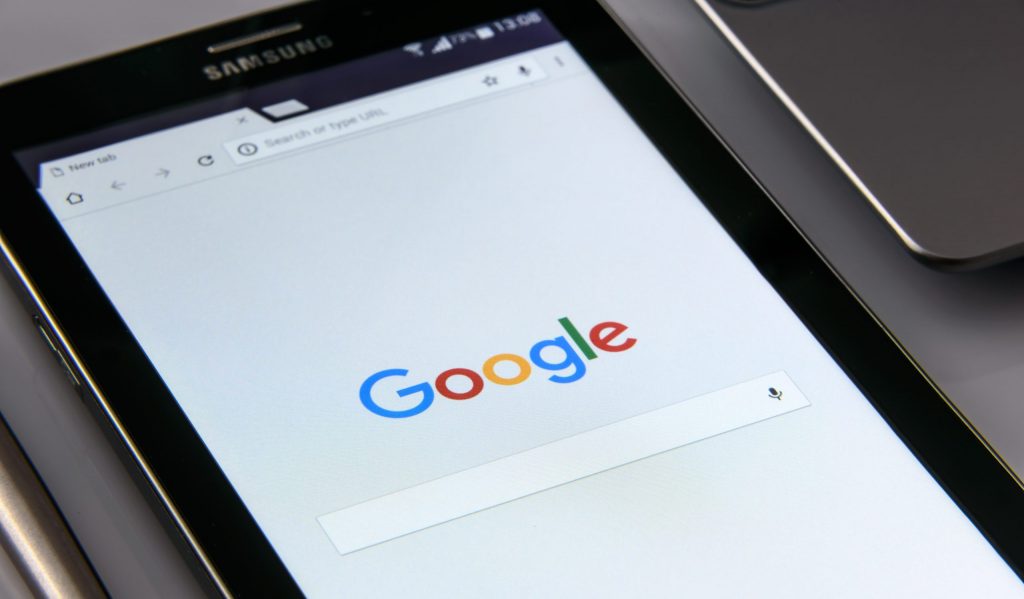 Black samsung tablet display google browser on screen