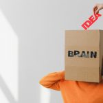 Box with brain inscription on head of anonymous woman