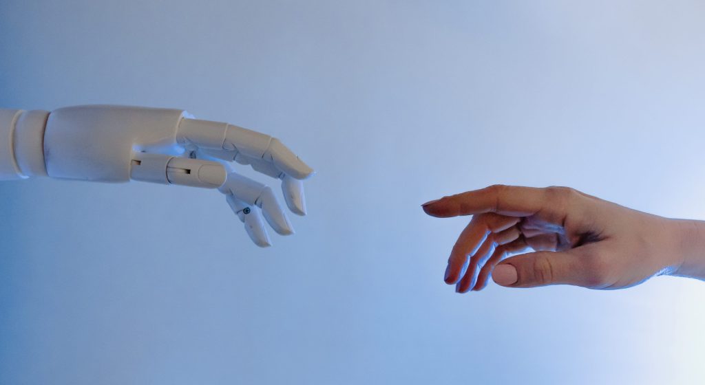 Person reaching out to a robot