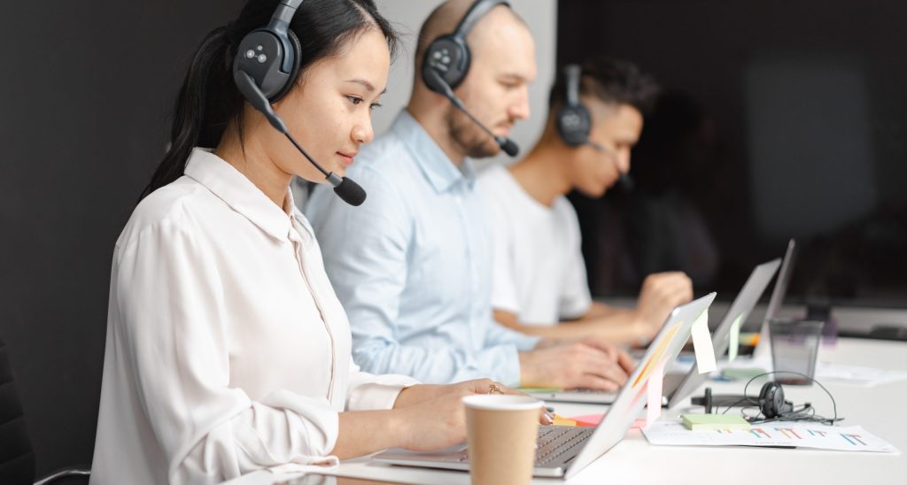 Shallow focus of woman working in a call center