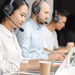 Shallow focus of woman working in a call center